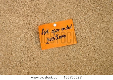 Ask Open-ended Questions Written On Orange Paper Note