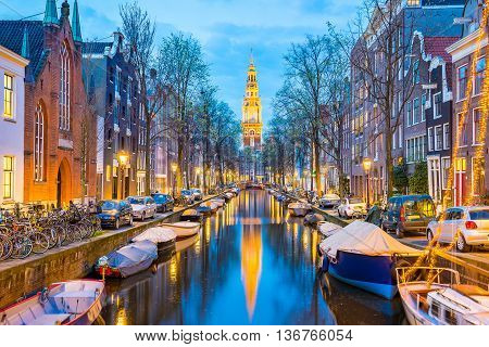 View of Chruch and canal in Amsterdam Netherlands.