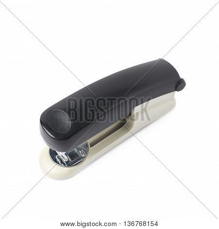Black office stapler isolated over the white background