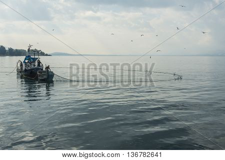 Tiberias, Israel - December 06 2013 : Net fishing in the Kinneret, Sea of Galilee