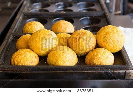 Rice Wrapped In An Omelette Shaped Like Takoyaki Japaness Food