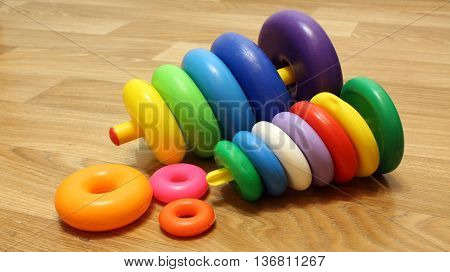Fallen toy pyramid plastic toys colored rings