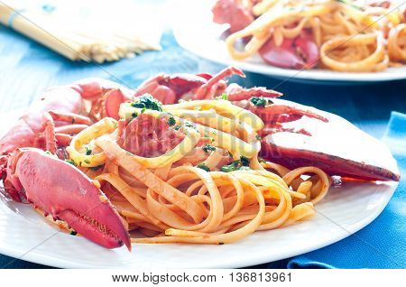 delicious cooked Italian pasta with a sauce of lobster