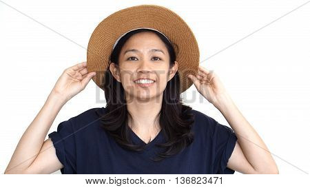 Casual Friendly Asian Girl Wearing Hat Relaxing And Smiling On Isolated Background