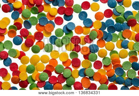 Сake decor background. Color round objects. Closeup shot.