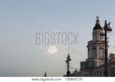 Fireworks near the green tower of the Kunstkammer on the Neva.