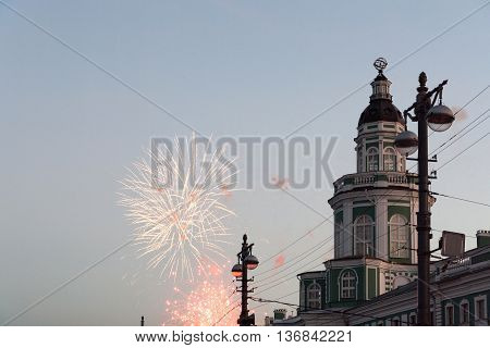 Fireworks near the green tower of the Kunstkammer on the Neva.