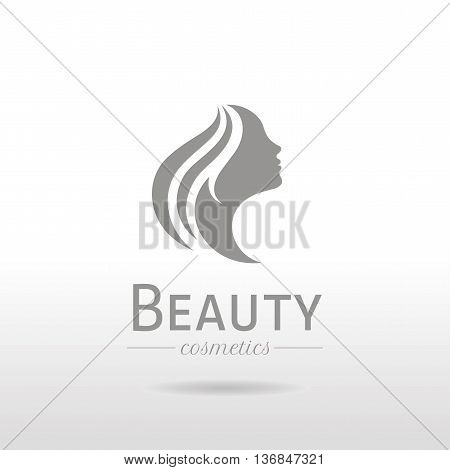 Elegant luxury logo with beautiful face of young adult woman with long hair. Sexy symbol silhouette of head with text lettering