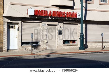 JOLIET, ILLINOIS / UNITED STATES - NOVEMBER 1,2015: One may have one's hair cut at Madga and Diana's Salon in downtown Joliet.