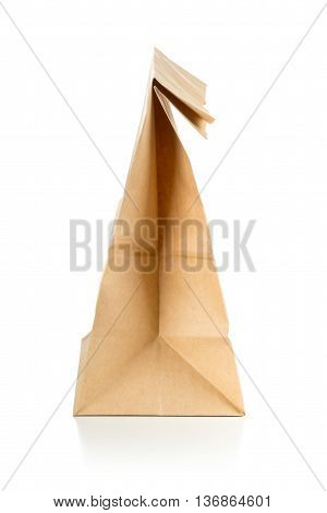 Clean brown paper doggy bag from recycled paper on white background