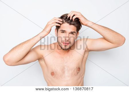 Fit Healthy Young Man Expertising His Hair And Looking For Furfur