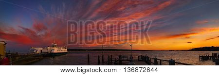 Bournemouth to Swanage Ferry in Poole Harbour under deep red skies