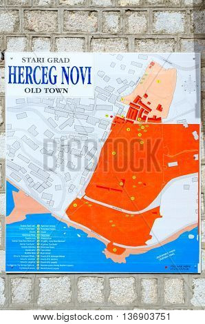 HERCEG NOVI MONTENEGRO - SEPTEMBER 25 2015: Plan of Old Town on stone wall of building located on Nikola Dzhurkovicha Square in Herceg Novi Montenegro