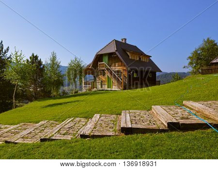 Traditional village Drvengrad Mecavnik in Serbia - architecture travel background