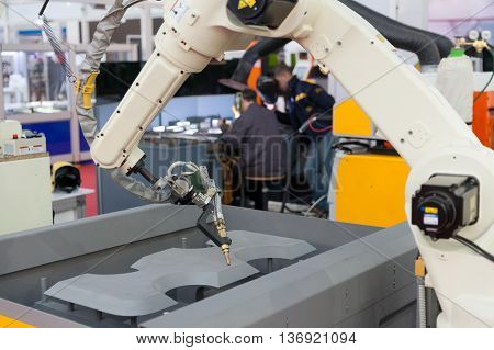 Robotic arm. Industrial robot arm for welding.
