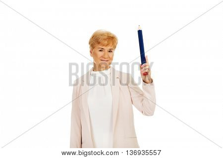 Smile elderly woman pointing up with hege pen