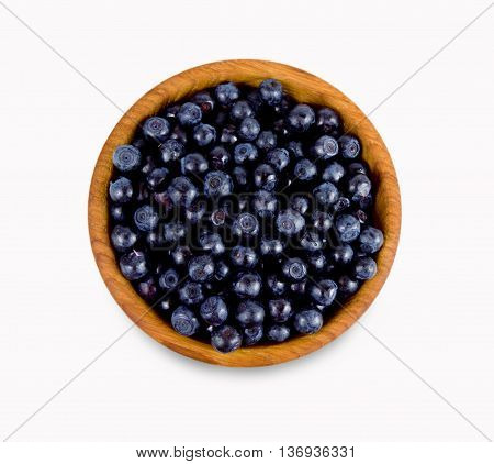 Ripe and tasty bilberries isolated on white background.