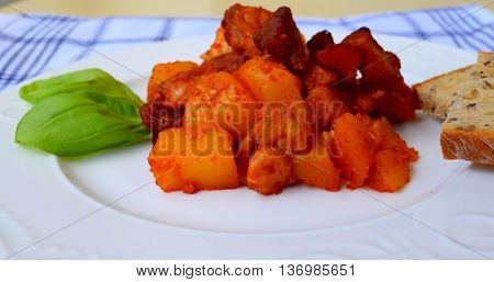 Delicious Baked potatoes with meat and bacon