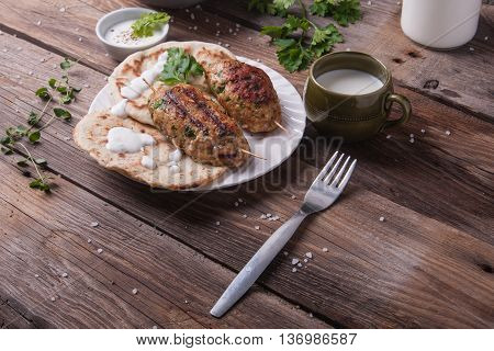 Kofta With Flatbread On Plate With Salad