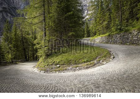 Winding mountain pavement road - a turn