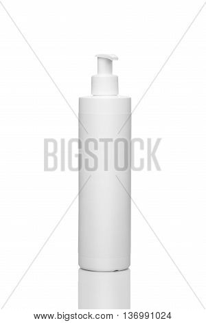 Plastic bottle with the batcher for liquid cosmetic isolated on a white background