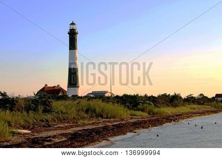 Fire Island Lighthouse at dusk from the water