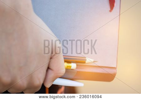 Education Learning Studying Concept : Asian Young Girl Holding Texbook With Pen And Pencil For Prepa