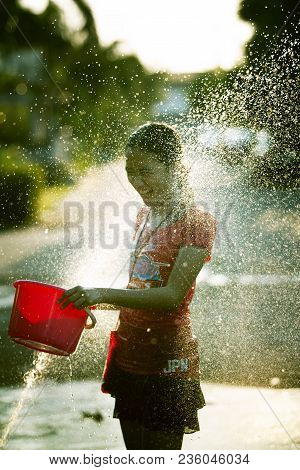 Bangkok Thailand - April14,2018 : Unidentified Thai Girl Playing Songkarn With Splashing Water And H