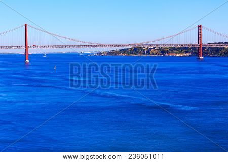 Lisbon, Portugal Landmark Ponte De 25th Abril Bridge And River Tagus Panorama