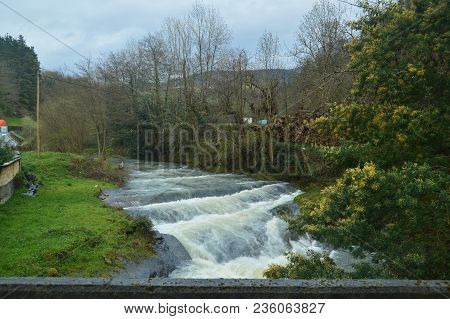 River Very Embravecido By The Rains In The Natural Park Of Gorbeia. River Nature Landscapes. March 2