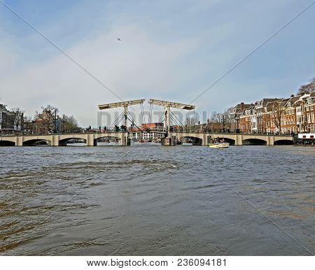 City scenic from the city Amsterdam with the Tiny Bridge in the Netherlands