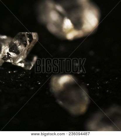 Macro Photo Of Sugar On A Black Background Looks Like Diamonds That Have Not Yet Processed
