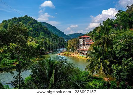 Beautiful View Of Villa On River Near Royal Gardens Of Peradenia Near Kandy, Sri Lanka