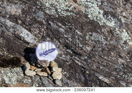 Cryptocurrency Mining Feathercoin In A Rock Background Composition