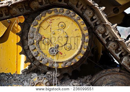 Chains Shovel In Yellow In Closeup, Wheel In Yellow