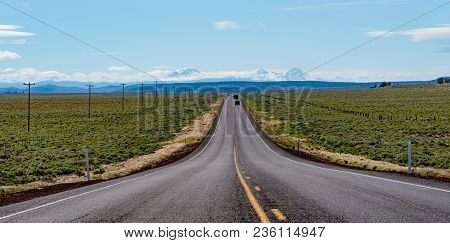 Lonely Central Oregon Highway Through High Desert Grassland