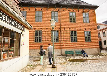 Oslo, Norway-august 13, 2014 - Traditional Old Houses And People At Norsk Folkemuseum.