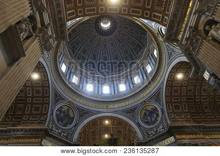 Vatican City, Vatican State -  April 10, 2018: Interior Of The Dome Of St. Peter Basilica Embellishe