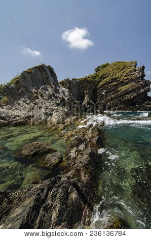 Hidden Beauty Of Kapas Island Located In Terenganu, Malaysia At Sunny Day. Blue Sky And Clear Sea Wa