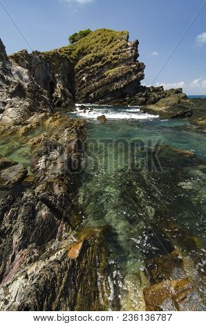 Hidden Beauty Of Kapas Island Located In Terenganu, Malaysia At Sunny Day. Blue Sky And Clear Sea Wa