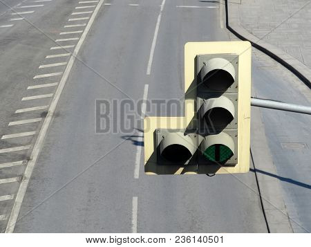 Green Traffic Light Over Empty Multiband Highway