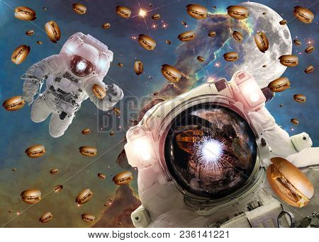 Astronauts In Outer Space With Cheseburgers On The  Pillar Of Creation And The Moon On The Backgroun