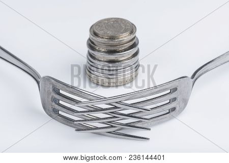Conceptual Representation Of Financial Greed By Two Forks And Coins