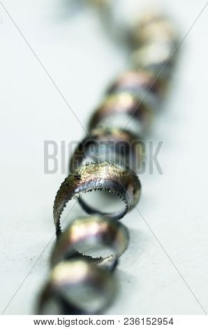 Metal Shavings Isolated On White Background. Macrophotography, Selective Focus