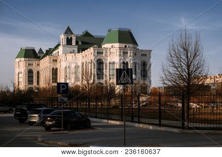 Astrakhan, Russia 12 Of April 2018: New Astrakhan Opera Theater In Sunny Spring Day With Cars Parked