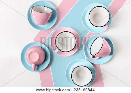 Clean Coffee Or Tea Set. Plenty Of Elegant Porcelain Light Blue And Pastel Pink Cups And At Funky Ab