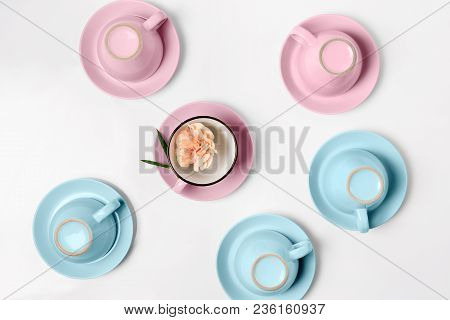 Clean Coffee Or Tea Set. Plenty Of Elegant Porcelain Light Blue Saucers And Pastel Pink Cups And At 