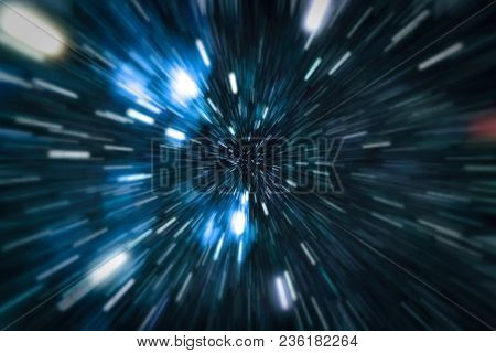 Abstract Of Warp Or Hyperspace Motion In Blue Star Trail.
