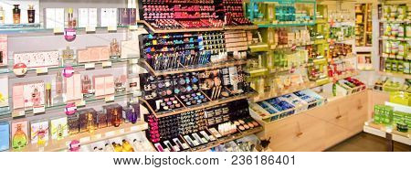 Blurred View On Perfumery At Retail Store In Europe. Perfumery In Local Supermarket, Defocused Backg