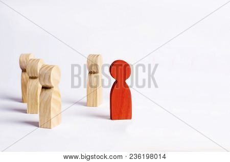 A Man Stands In The Crowd And Looks The Other Way On A White Background. Concept Meeting Rally. Anot
